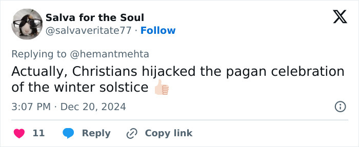 Tweet discussing Christians, pagans, and the winter solstice amid holiday billboard debates.