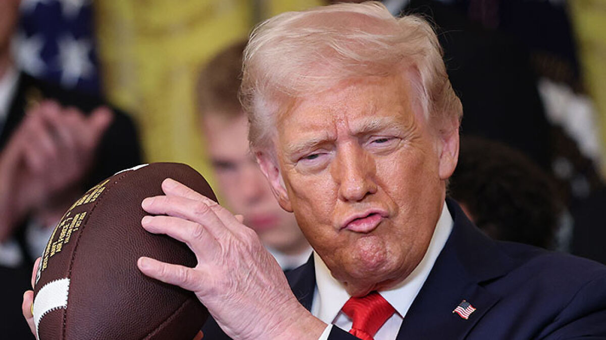 “Keep Them Down”: Trump Pulls Absurd Stunt To Look Taller Than Towering Ohio State Football Team