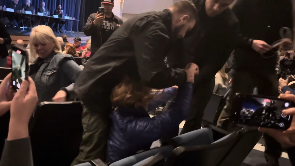 Six Charged After Woman Was Manhandled And Dragged From Republican Town Hall