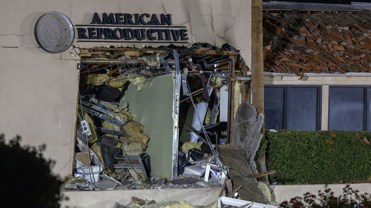 Damaged American Reproductive IVF clinic with debris and broken walls after an explosion linked to pro-moralist bomber incident.