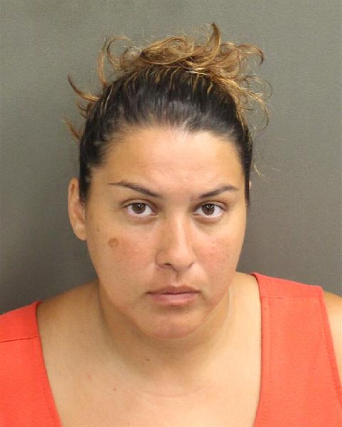 Mugshot of a woman accused in a case involving a boy who ate in teacher's classroom and had issues fitting in.