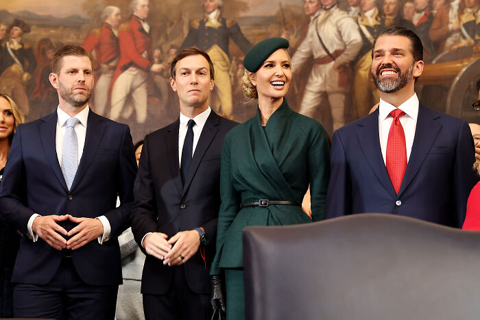 Barron Trump’s siblings attending a formal event with elegant attire, amid U.S. citizenship discussion and family debate.