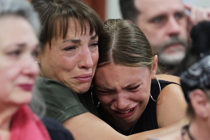 Women visibly upset and crying, reacting emotionally to new shocking Bryan Kohberger documents about victims.
