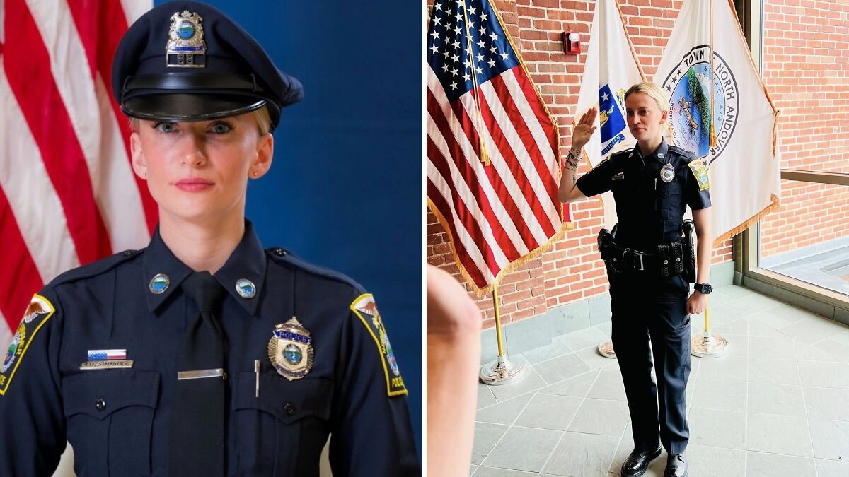 Female off-duty cop in uniform taking an oath near American and town flags during a ceremony