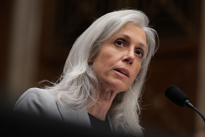A woman with gray hair speaking into a microphone, representing CDC leaders amid concerns over RFK Jr health plans.