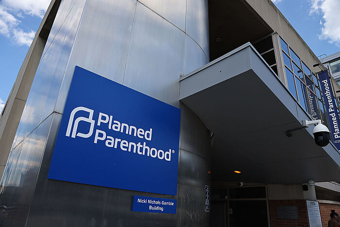 Planned Parenthood building exterior representing changes in women’s reproductive rights and health cuts in the U.S. and abroad.