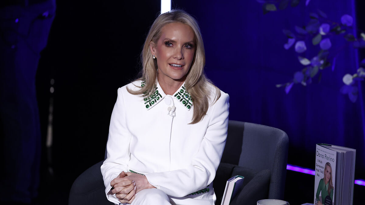 Dana Perino seated in white outfit during a Fox News event, with book visible on the side addressing Gavin Newsom posts.