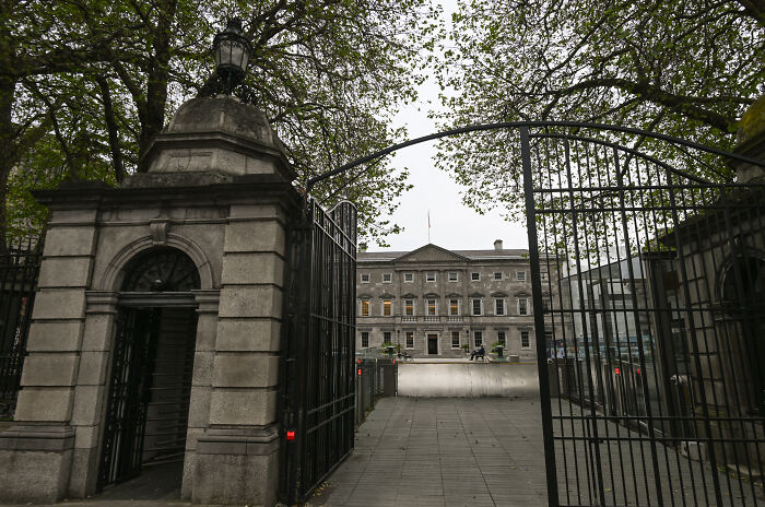 Entrance gate to an official Irish government building, relevant to Conor McGregor’s Irish presidency bid challenges.