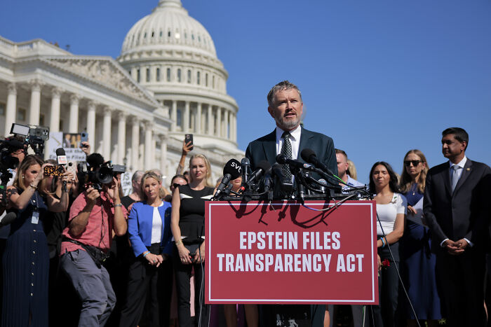 John Paulson speaking at a press event near the U.S. Capitol about Epstein files transparency and related accusations.