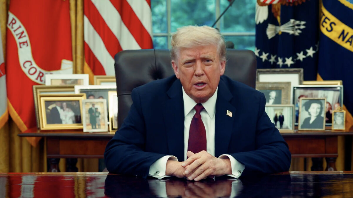 Donald Trump seated at a desk, with flags and framed photos behind, in a video with AI use accusations and glitches.
