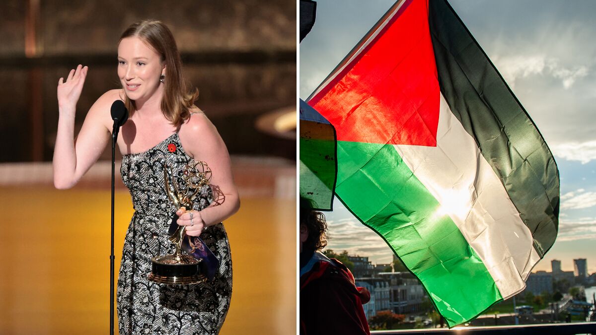 Person holding Emmy award on stage and a waving Palestine flag during a protest supporting Free Palestine.
