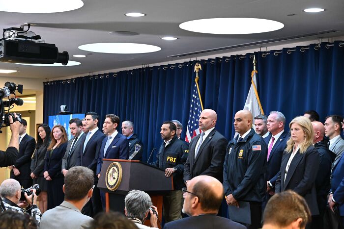 FBI officials and law enforcement at a press conference addressing NBA gambling cases involving mafia money and insider bets. FBI officials and law enforcement at a press conference addressing NBA gambling cases involving mafia money and insider bets.
