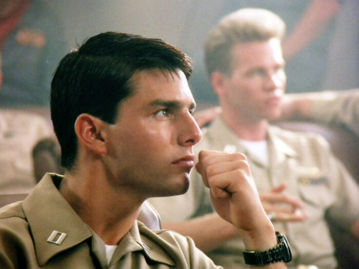 Actor in a military uniform deep in thought, representing the ‘Danger Zone’ singer's request to remove song from King Trump video.