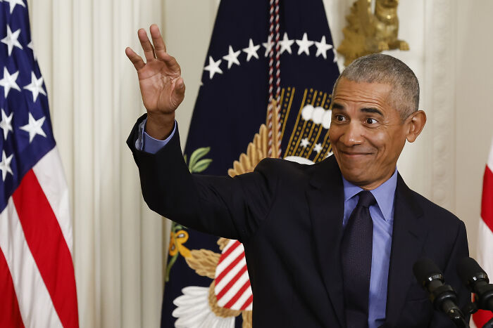 Barack Obama in a suit gesturing with his hand during a speech, related to Pelosi endorsement and Kamala Harris news. Barack Obama in a suit gesturing with his hand during a speech, related to Pelosi endorsement and Kamala Harris news.