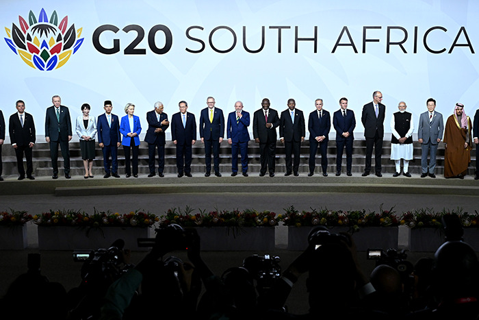 G20 leaders stand on stage at South Africa summit, highlighting new energy initiatives amid global power discussions. G20 leaders stand on stage at South Africa summit, highlighting new energy initiatives amid global power discussions.