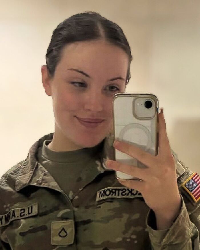 National Guard member in uniform taking a selfie, related to D.C. shooting and prosecutorial death penalty vow. National Guard member in uniform taking a selfie, related to D.C. shooting and prosecutorial death penalty vow.