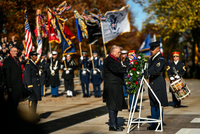 Donald Trump honors fallen heroes with a Veterans Day tribute, featuring military honors and a ceremonial wreath. Donald Trump honors fallen heroes with a Veterans Day tribute, featuring military honors and a ceremonial wreath.