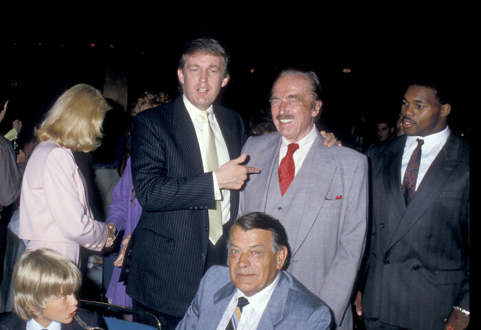Donald Trump and older men in suits at a formal event, relating to claims about dementia in Trump’s family. Donald Trump and older men in suits at a formal event, relating to claims about dementia in Trump’s family.