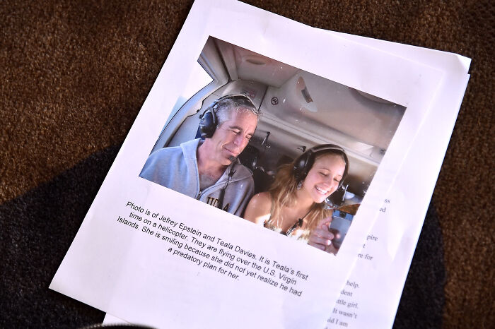 Printed photo showing Jeffrey Epstein and Teala Davies on a helicopter, related to Christina Ricci slamming Megyn Kelly over Epstein comments. Printed photo showing Jeffrey Epstein and Teala Davies on a helicopter, related to Christina Ricci slamming Megyn Kelly over Epstein comments.
