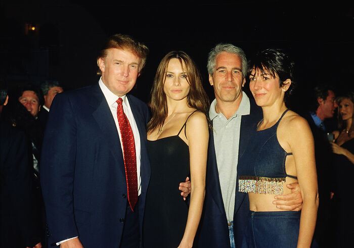 Donald Trump and Jeffrey Epstein posing with two women at a formal event related to Epstein claimed Trump knew about the girls.