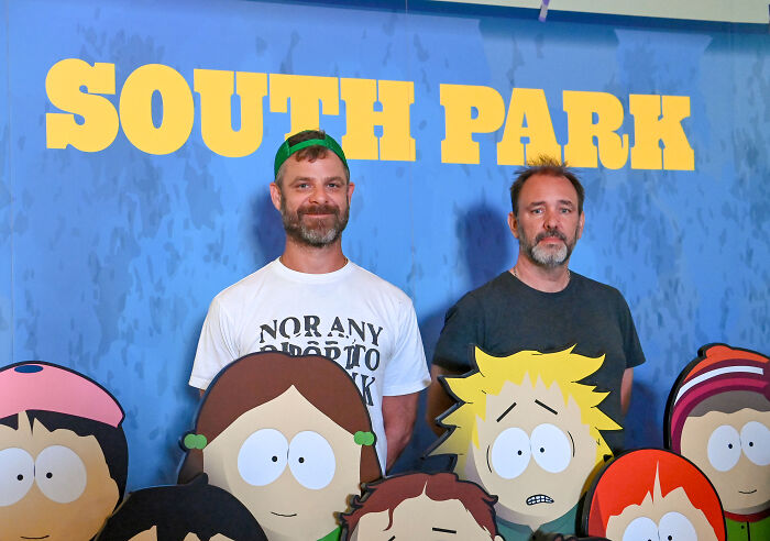 Creators of South Park posing behind cartoon character cutouts at a promotional event for the show featuring an intimate Trump-JD Vance scene. Creators of South Park posing behind cartoon character cutouts at a promotional event for the show featuring an intimate Trump-JD Vance scene.