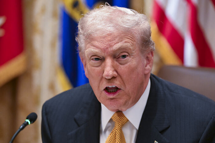 Donald Trump speaking emphatically at a formal event, discussing MAGA voter concerns and grocery prices. Donald Trump speaking emphatically at a formal event, discussing MAGA voter concerns and grocery prices.