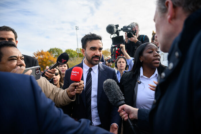 Zohran Mamdani speaking to reporters and holding press conference on democratic socialism during NYC mayoral campaign. Zohran Mamdani speaking to reporters and holding press conference on democratic socialism during NYC mayoral campaign.