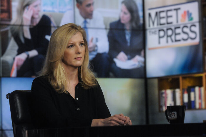 Woman with blonde hair in a black shirt on a Meet the Press set, related to influential people appearing in Epstein emails.