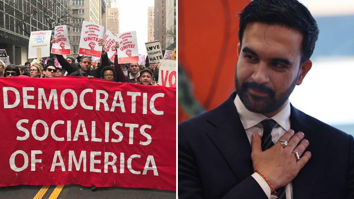 Crowd holding Democratic Socialists of America banner during protest, alongside portrait of Zohran Mamdani in suit.