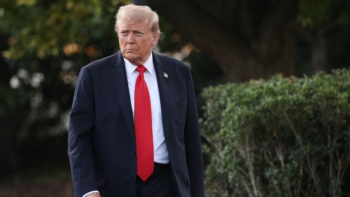 Former President Trump walking outdoors in a suit and red tie amid 60 Minutes struggles to get on-camera guests.