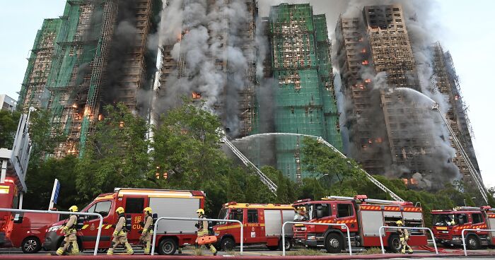 Fatalities From Hong Kong Apartment Complex Fire Rise To 128, Officials Say