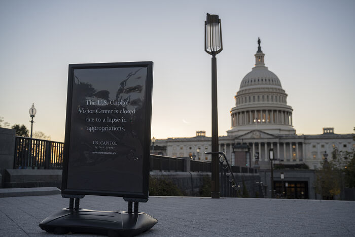 Sign near the U.S. Capitol stating the visitor center is closed during shutdown amid White House trolls Democrats dispute. Sign near the U.S. Capitol stating the visitor center is closed during shutdown amid White House trolls Democrats dispute.