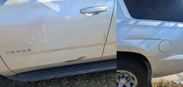 White Tahoe SUV with visible side scratches and dents, related to federal agent shooting incident in Chicago. White Tahoe SUV with visible side scratches and dents, related to federal agent shooting incident in Chicago.