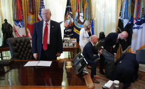 Donald Trump's Face Is Priceless After Man Faints Right Behind Him