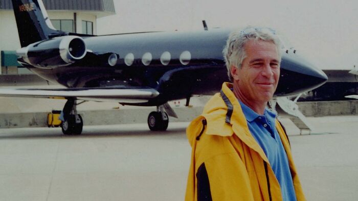 Jeffrey Epstein standing near a private jet, related to DOJ files detailing Trump’s travel on Epstein’s jet. Jeffrey Epstein standing near a private jet, related to DOJ files detailing Trump’s travel on Epstein’s jet.