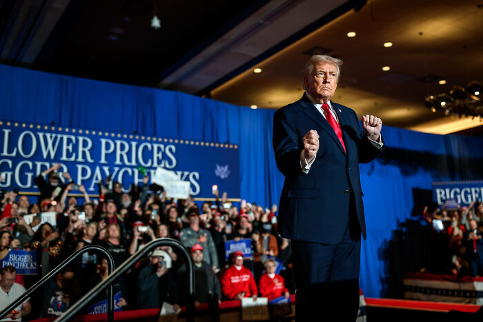 Donald Trump at a rally, sending unnerving signal about his plans for the future with supporters in the background. Donald Trump at a rally, sending unnerving signal about his plans for the future with supporters in the background.