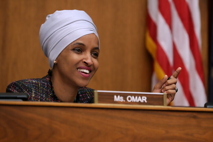 Ilhan Omar speaking during a congressional hearing, responding to questions and going viral for her remarks.