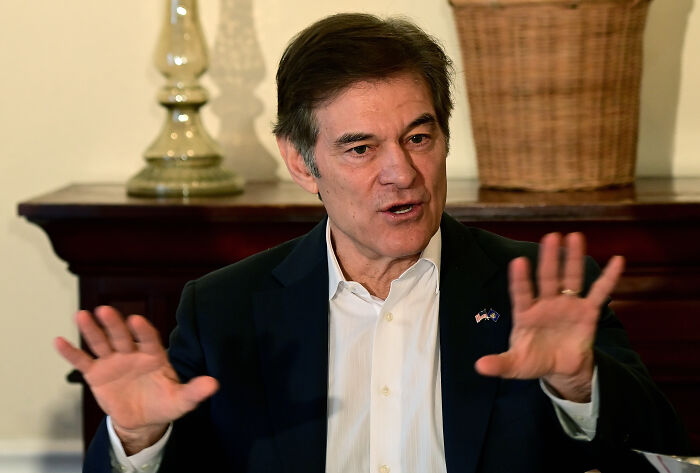 Dr. Oz speaking with expressive hand gestures, advising federal workers on eating less after government shutdown. Dr. Oz speaking with expressive hand gestures, advising federal workers on eating less after government shutdown.