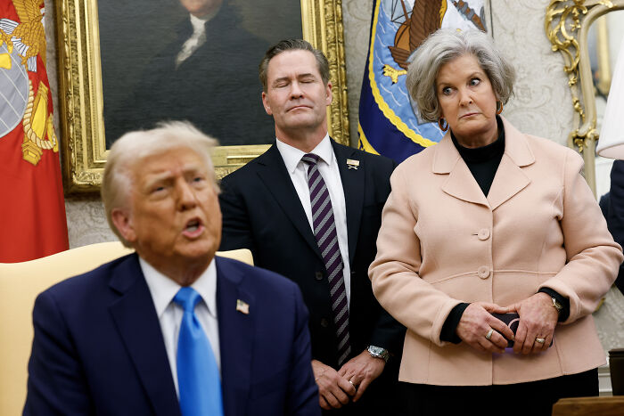 Trump’s chief of staff backpedaling with concerned expression during a meeting in the Oval Office. Trump’s chief of staff backpedaling with concerned expression during a meeting in the Oval Office.
