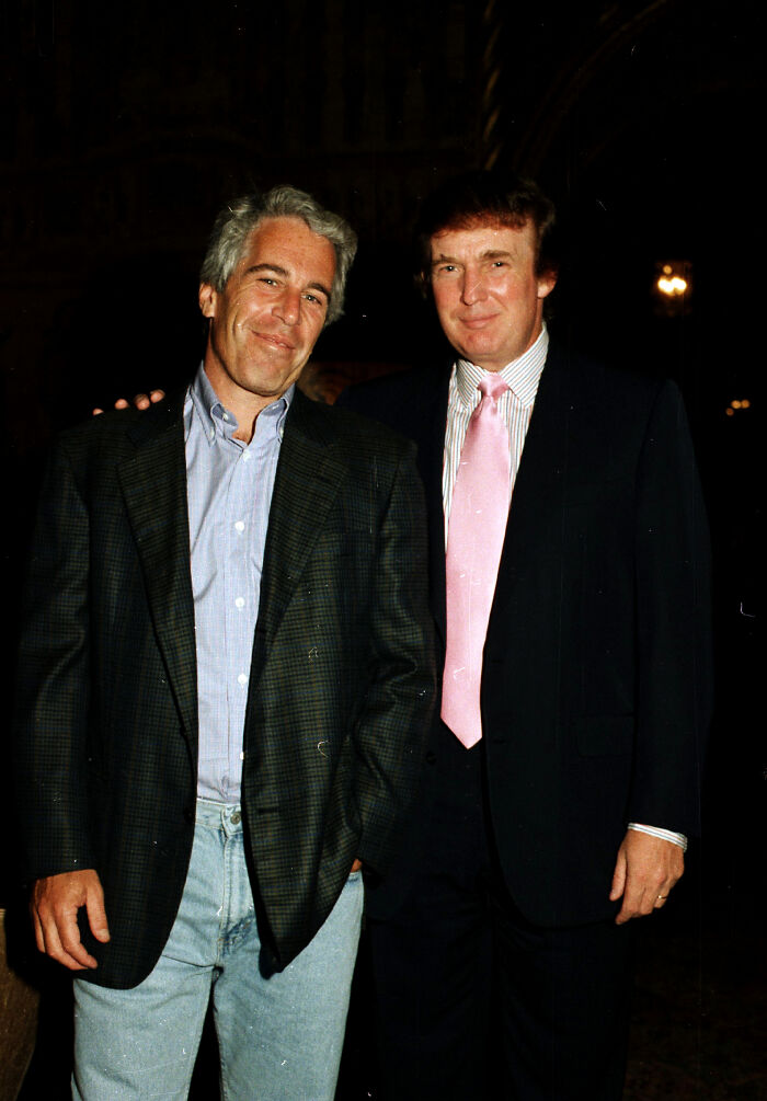 Jeffrey Epstein and Donald Trump posing together, relating to DOJ files on Trump’s travel on Epstein’s jet. Jeffrey Epstein and Donald Trump posing together, relating to DOJ files on Trump’s travel on Epstein’s jet.
