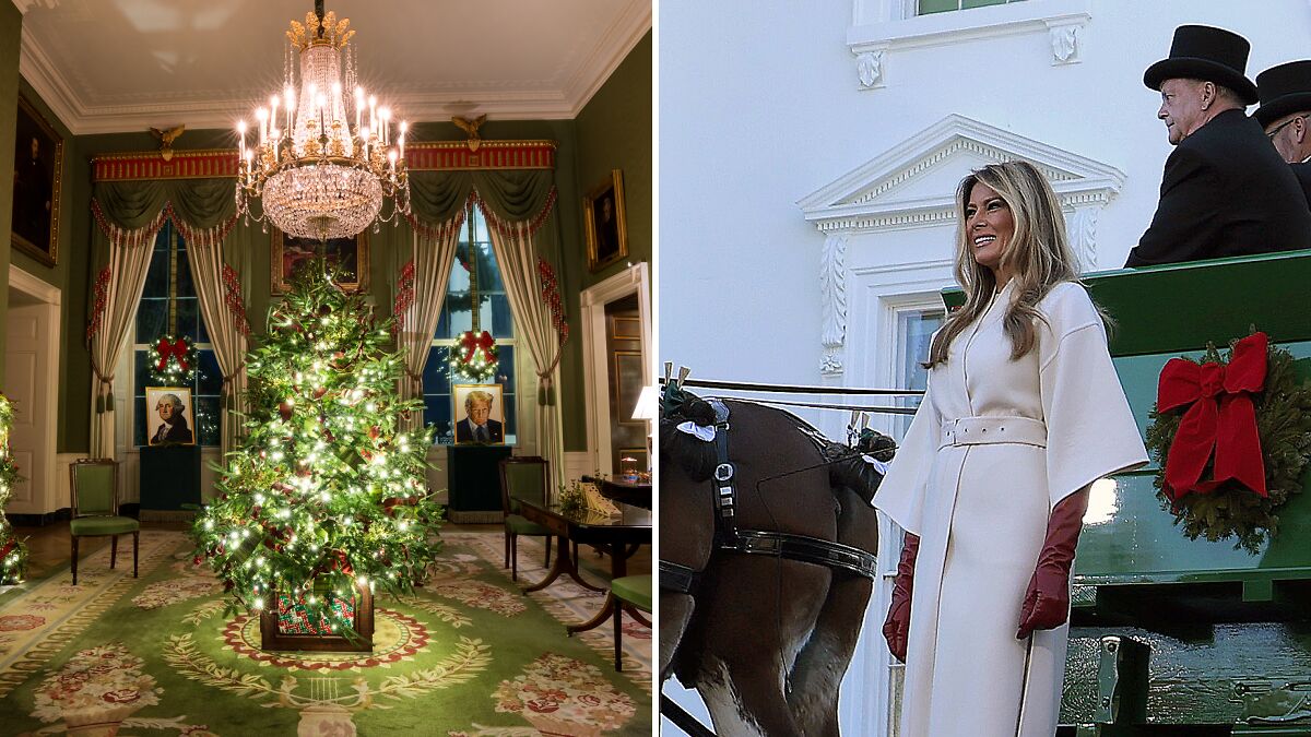 Melania Trump standing outside White House near Christmas wreath and horse carriage next to decorated Christmas tree indoors.