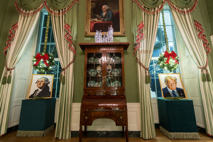 Elegant 2025 Christmas decorations featuring festive wreaths and holiday accents in a classic room setting linked to Melania Trump