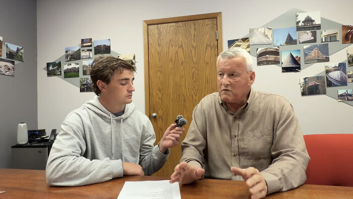 Two men in an interview setting discussing Minnesota child care funds and widespread fraud allegations. Two men in an interview setting discussing Minnesota child care funds and widespread fraud allegations.