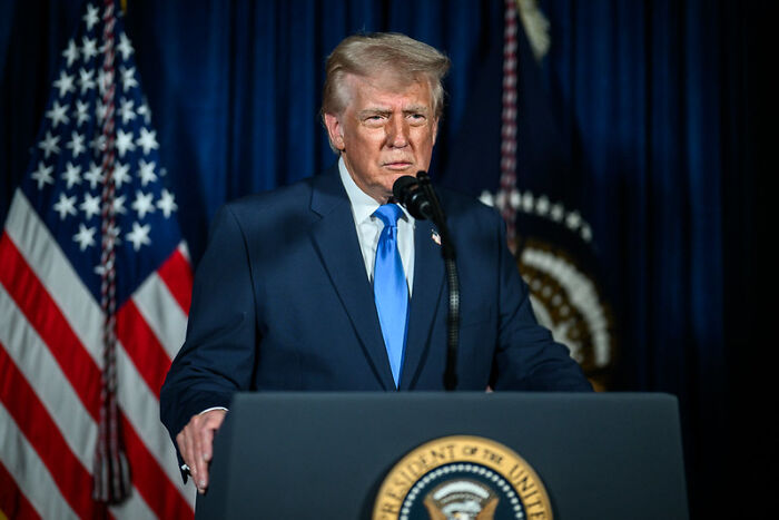Donald Trump speaking at a podium with US flags and presidential seal, related to Trump administration accused Taliban funding. Donald Trump speaking at a podium with US flags and presidential seal, related to Trump administration accused Taliban funding.