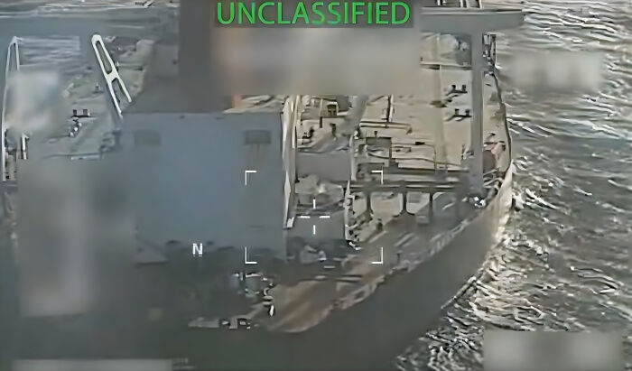 Aerial view of an oil tanker near Venezuela during a Trump admin operation capturing the vessel on the water.