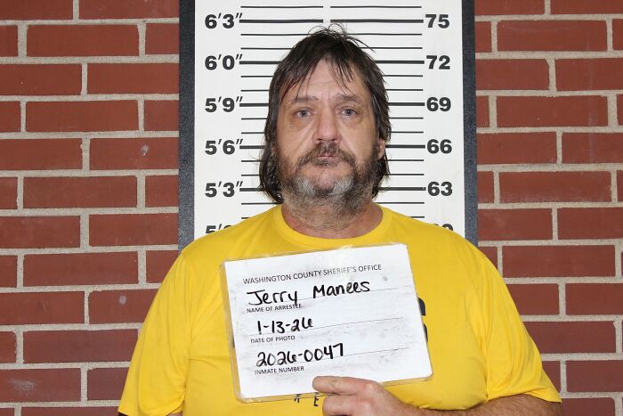 Mugshot of a man in a yellow shirt against height chart, related to Missouri couple charged after teens locked in chicken pen. Mugshot of a man in a yellow shirt against height chart, related to Missouri couple charged after teens locked in chicken pen.