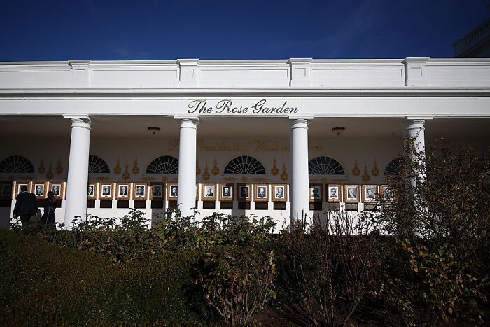 The Rose Garden at the White House with a new sign, reflecting Donald Trump&rsquo;s on-brand style and presence.