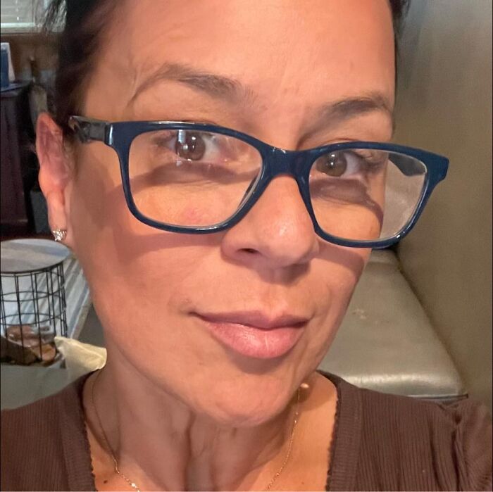 Woman wearing glasses taking a close-up selfie related to Miami Beach mayor free-speech police questioning controversy. Woman wearing glasses taking a close-up selfie related to Miami Beach mayor free-speech police questioning controversy.