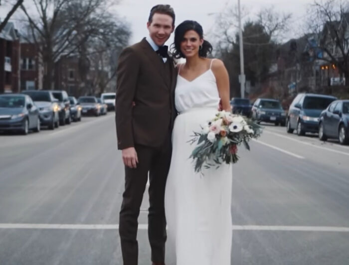 Slain Ohio couple in wedding attire standing on a street, bride holding bouquet, groom in brown suit Slain Ohio couple in wedding attire standing on a street, bride holding bouquet, groom in brown suit
