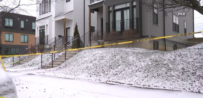 Townhouse with yellow police tape in snow, crime scene linked to slain Ohio couple surveillance video Townhouse with yellow police tape in snow, crime scene linked to slain Ohio couple surveillance video